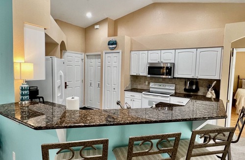 Pelican House | Heated Pool home in the Rose Garden Tarpon Point area!