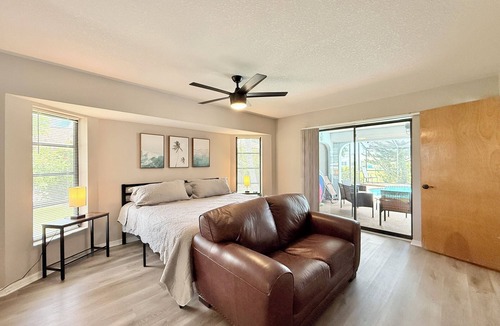 Pebble Beach House | !HEATED POOL/LANAI-BBQ-CANAL WATERFRONT-NEAR BEACH/GOLF/PARK/TENNIS/RESTAURANTS!