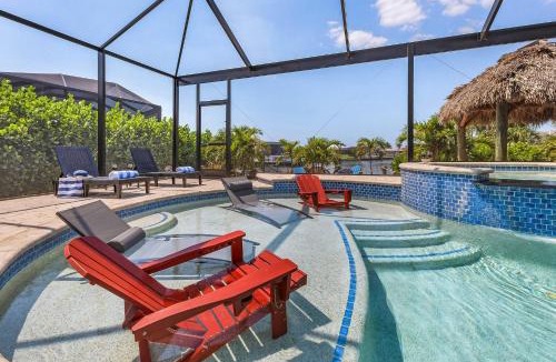 Burnt Store House | Heated Saltwater Pool & Spa with Tiki Hut - Backyard Oasis - Roelens