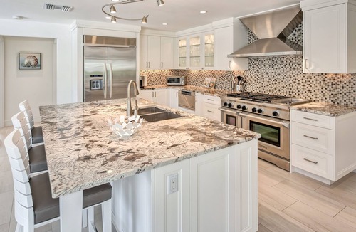 Vanderbilt Beach House | Hidden Gem on the Water: Luxury 3BR + Den Pool Home Near Vanderbilt Beach