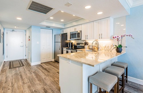 Marco Island Condo | 🐠 HIGHLY RATED! Remodeled Sea Winds Beachfront 10th Floor Double Vanity Sinks