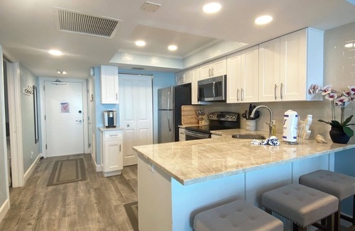 Marco Island Condo | 🐠 HIGHLY RATED! Remodeled Sea Winds Beachfront 10th Floor Double Vanity Sinks