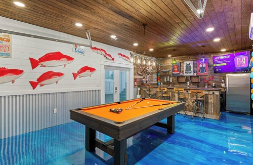 Holiday Isle House | Holiday Isle Home, Pool, Balcony & Tiki Cruise
