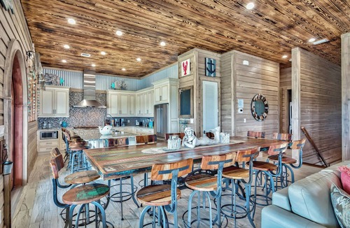 Holiday Isle House | Holiday Isle Home with Heated Pool & Tiki Cruise