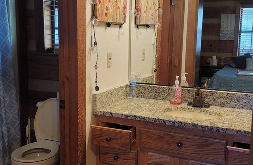 Grovetown Cabin | Home is set on10 acres w/pond, pool, spa, & only 9 miles to Masters golf course.