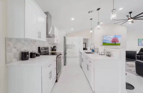 Mariner House | Home with heated pool and a pool table in Cape Coral