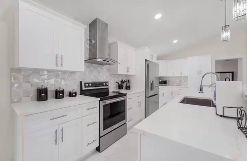 Mariner House | Home with heated pool and a pool table in Cape Coral