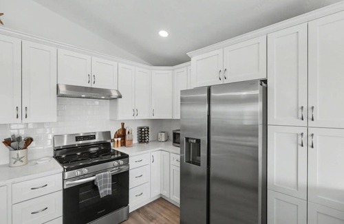 Estero Bay Shores House | Immaculate bay front home w/in ground pool, spa, paver patio & porch