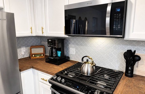 Sylvania House | In-Town Sylvania Cottage with Fireplace, Deck & Renovated Interior