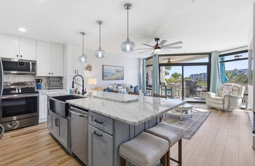 New Smyrna Beach Condo | Intracoastal Waterfront Escape w/Dock, Hot Tub & Walk to Beach
