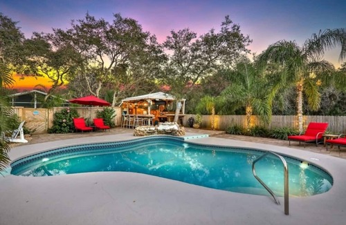 Butler Beach House | Island Retreat - Backyard Oasis w/Pool/NEW Hot Tub/Tiki Bar