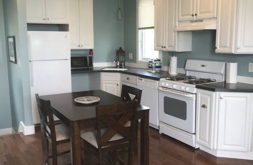 Sea Bright Apartment | Just listed. Steps to beach. 40 min ferry to NYC. Partial ocean views from home.