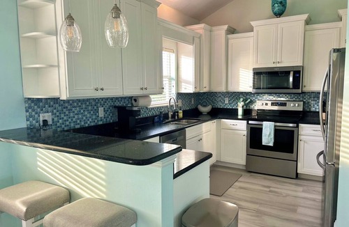 Safety Harbor Club House | KEY LIME TIME, Gulf view, newly renovated 5 bedroom/5 bath house with pool.