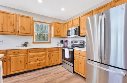 Higgins Lake House | Lake View Fully Stocked Family Retreat - Paddleboards, Firepit, Games, EV outlet