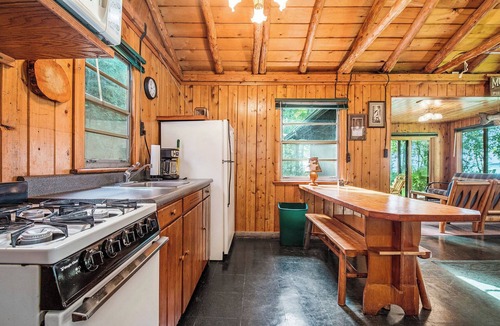 Mullett Lake Cabin | Lakefront Cottage - Beautiful Grounds and Large Sandy Beach