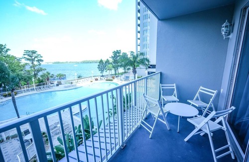Florida Central Atlantic Coast Apartment | Lakefront resort condo w/balcony, pool, jacuzzi & arcade fun!