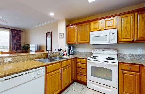 Florida Central Atlantic Coast Condo | Lakefront retreat near attractions with lake view, AC, WiFi, pool, hot tub & gym
