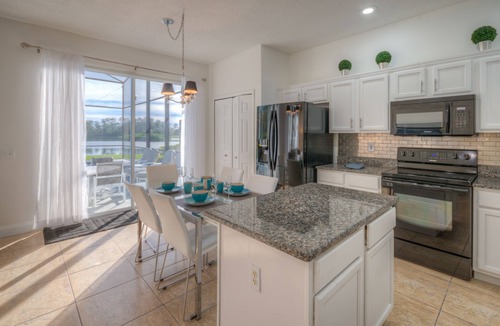 Lake Berkley Villa | Lakeside house, huge south facing pool with spa, lake view, Disney at 8 miles