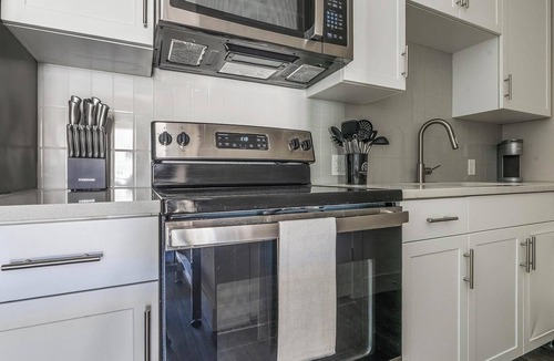 West 1st Street Apartment | Landing | Chic 1BD, Gym