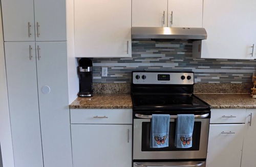 Interchange Square House | Large 4bd 2bth pool home with hot tub, waterfall feature and private back yard!