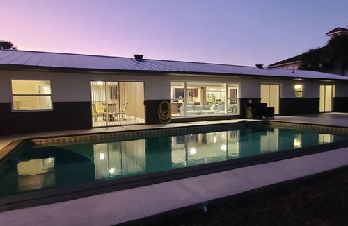 Indian River Residence House | Launch & Lounge: Rocket views, pool and dock