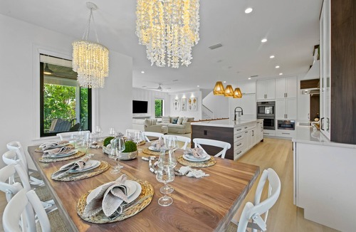 Sarasota House | Lido Key Family Home with Waterslide & Rooftop Views Steps to Beach -Vitamin Sea