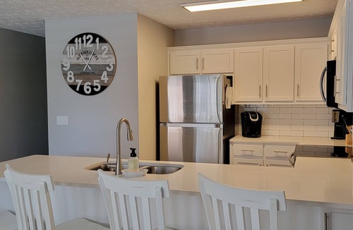 Miramar Beach Condo | Like new & across the street from public beach access 73! Family friendly!