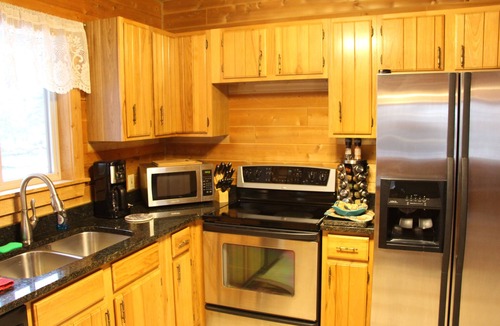 Indian River Cabin | Log Cabin home on the Sturgeon River in Indian River