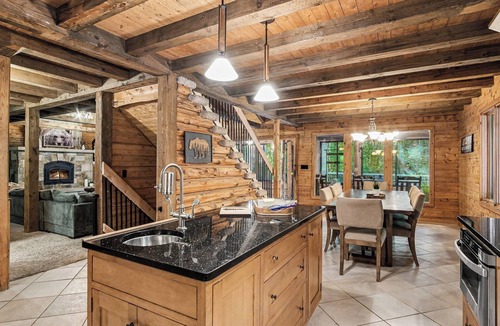 Plainwell Cabin | Log Lodge with Hot Tub, Arcade & Movie Theater
