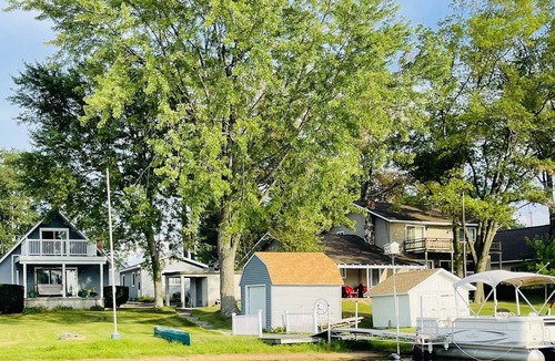 West Branch Cottage | Loon Lookout has its own beach and is on a private lake in West Branch, MI