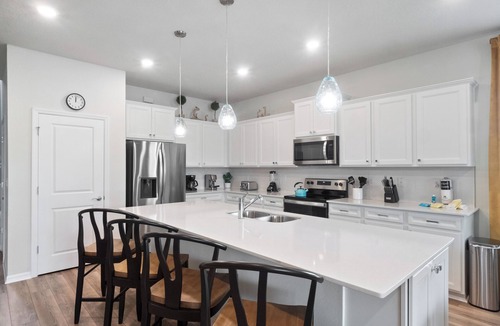 Four Corners House | Luxurious 7 BR Home with Arcade Room in Windsor Cay - Blue Sky Villas