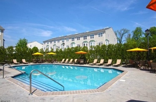 Belleville House | Luxurious townhouse with king suite & living room in a secure gated community.
