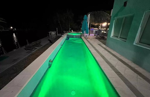 Marathon House | Luxury Duck Key Waterfront Estate-Heated-Chilled-Pool-Spa Boat Lifts Golf Cart