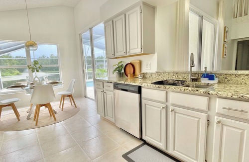 Chatham Park House | Luxury Home Close to Disney, Pool Lake Sunset View