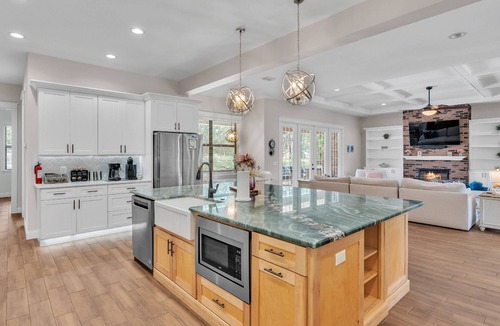 Nichols House | Luxury Lakeland Retreat | Heated Salt Pool, Outdoor Kitchen & Firepit | Pet-Friendly Yard