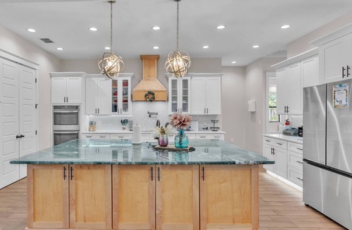 Nichols House | Luxury Lakeland Retreat | Heated Salt Pool, Outdoor Kitchen & Firepit | Pet-Friendly Yard