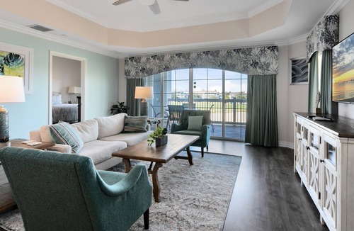 Reunion Condo | Luxury Reunion Resort golf course view 3-bedroom vacation condo with private patio balcony