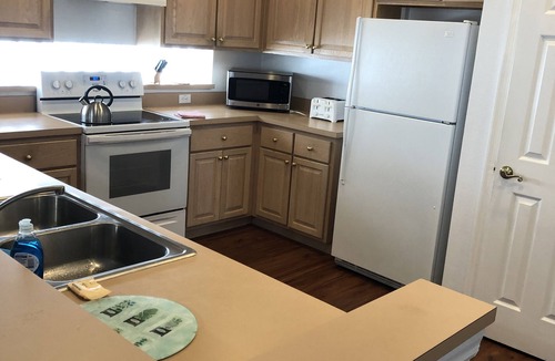 West Kissimmee Villa | Luxury villa Near Disney Gated Lake View Heated Pool w/sunset & home office