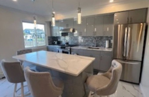 Copiague Apartment | Luxury Waterfront Getaway: Pool, Fishing & Basketball! Stunning water views