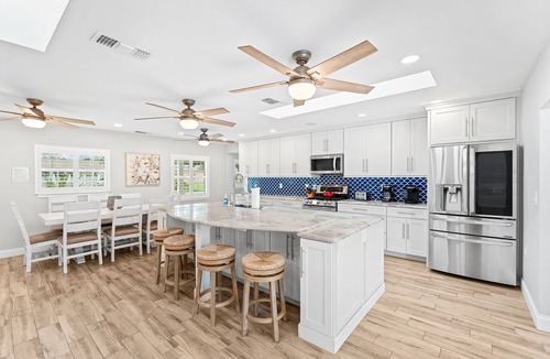 Convair Cove House | Luxury Waterfront Oasis w/Saltwater Pool, Boat Dock & Fire Pit! 🌊