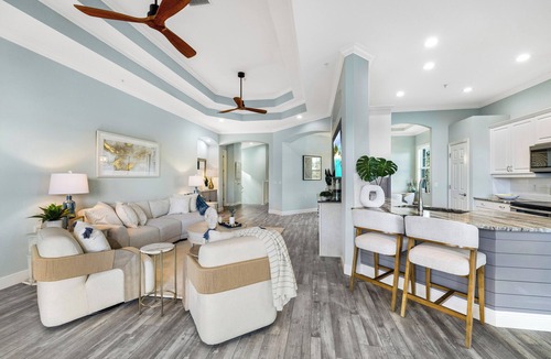 Miromar Lakes Condo | Luxury Waterfront Rental with wraparound water views at Miromar Lakes,
