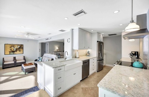 Shell Harbor House | Manatee Cove - Gorgeous Canal Front Home with Heated Pool and Deeded Beach Access!