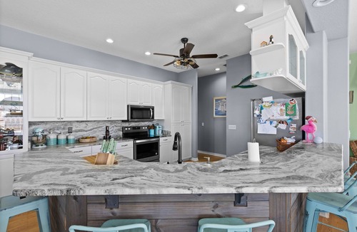 Spring Hill House | Manatee time! Waterfront Home, floating dock, kayaks, paddle boards, gulf access