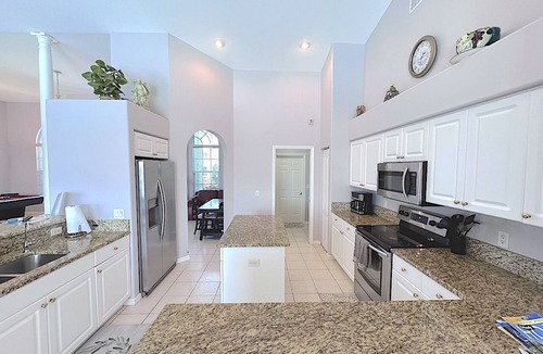 Pelican House | Michaela 1059 Gulf Access 3BR Heated Pool/Spa and Large Dock with Tiki, Kayaks Included