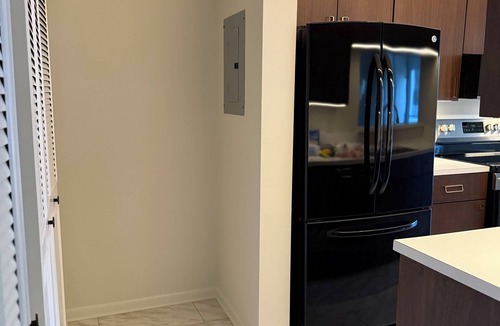Hypoluxo Condo | Midterm Rental of art deco styled condo with Intracoastal view + access.