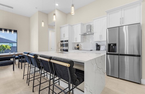 Burnt Store House | Modern 4-bed home with private heated pool, outdoor bar and grill in Cape Coral!