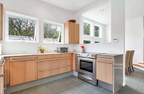 Bridgehampton House | Modern Bridgehampton retreat w expansive yard, heated pool, close to town.