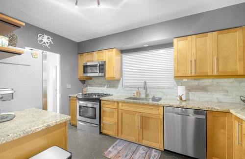Parrot Cove House | Modern Coastal Home with Cottage & Pool near Beach, Golf & Dining