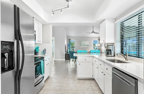 Cape Coral House | Modern Coastal Waterfront Retreat with Heated Pool & Dock
