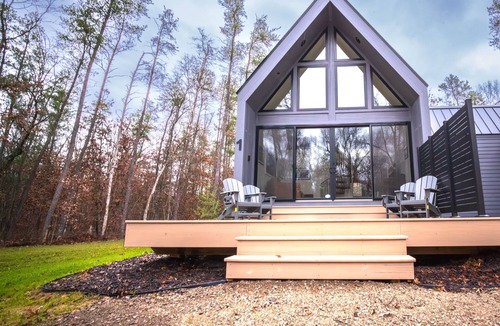 Wellston Ski Chalet | Modern Forest Chalet Sleeps 6 Starlink Rivers & Caberfae Pet-Friendly